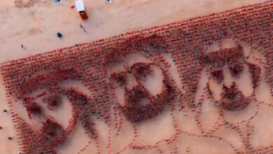 چهره رهبران دبی، با پرچم روی ساحل ام سقیم نقش بست